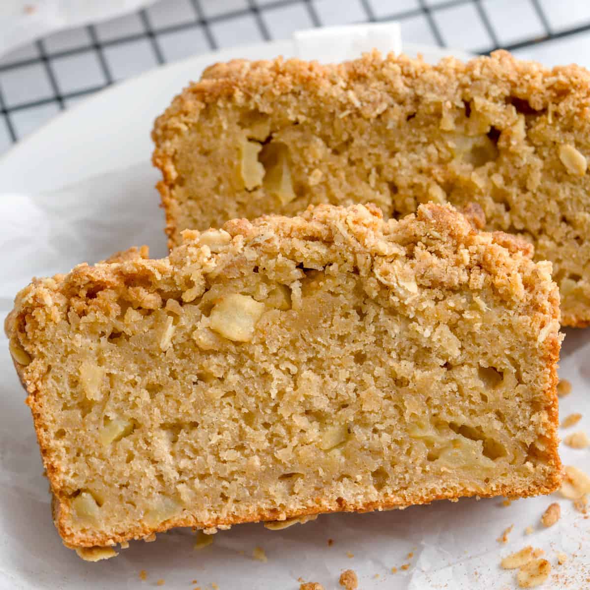Moist maple apple cake with chunks of apple and a crisp oatmeal streusel topping, perfect for cozy f