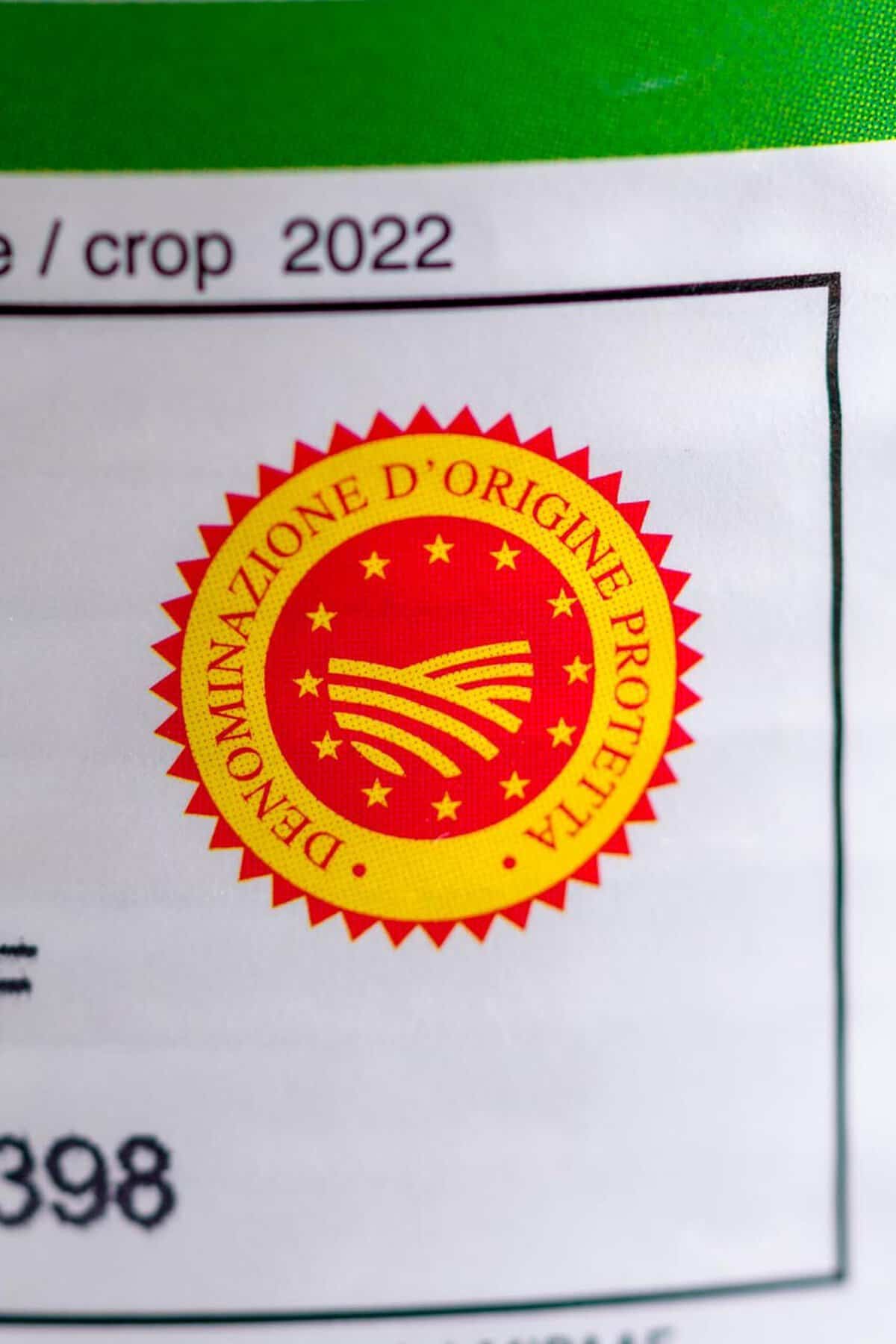 Close up shot of the DOP seal on a can of San Marzano tomatoes