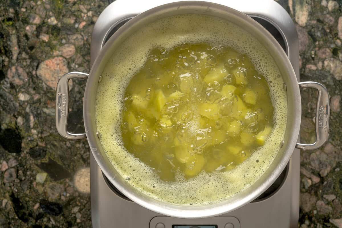Overhead shot of boiled potatoes for creamy mashed potatoes.