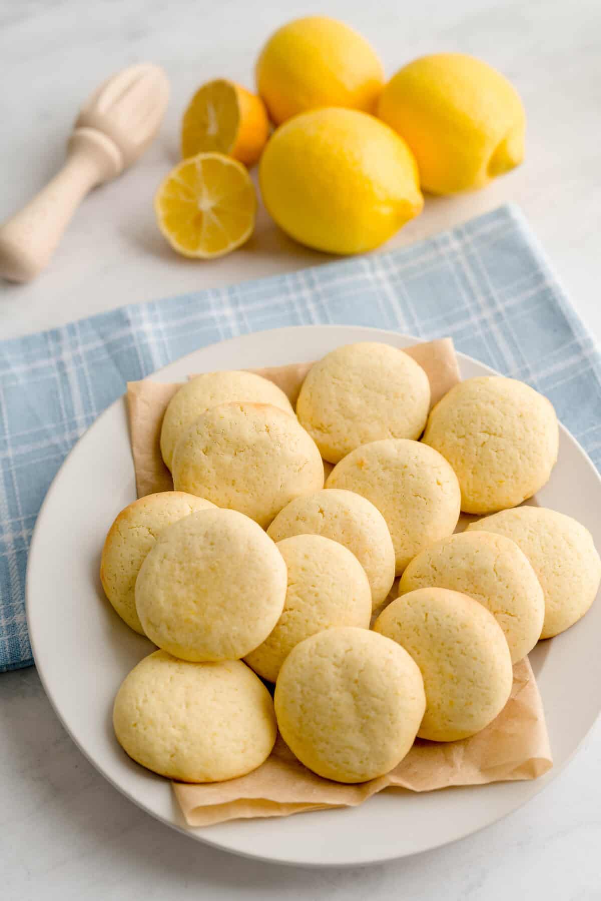 Easy lemon ricotta cookies grouped on a plate.