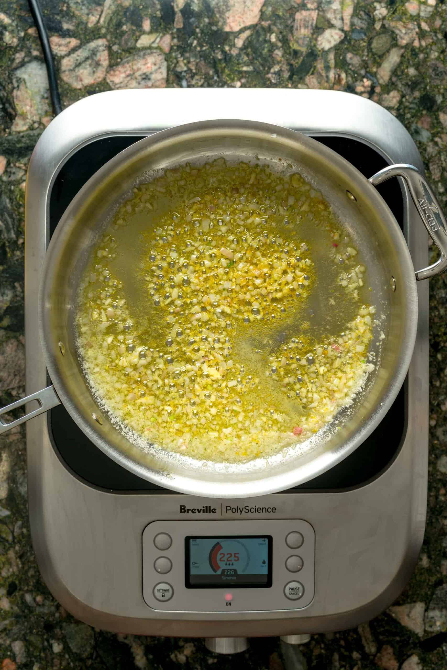 Sautéing aromatics for creamy lemon pasta.