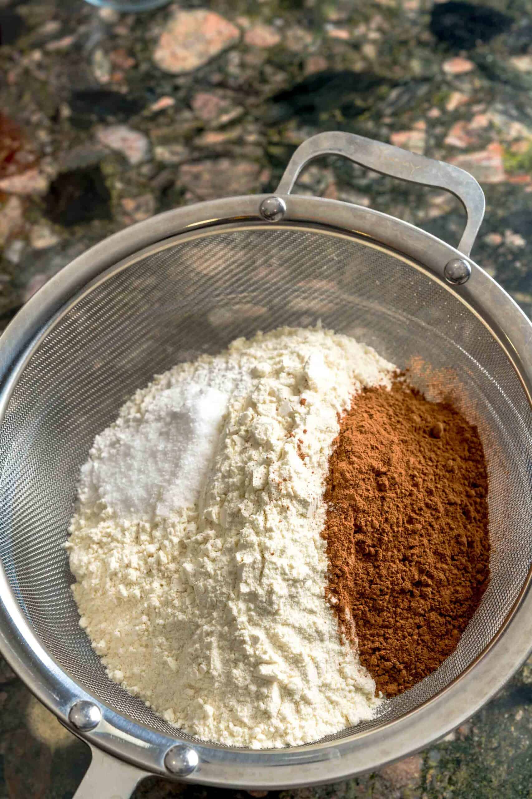 Sifting dry ingredients for Italian biscotti recipe