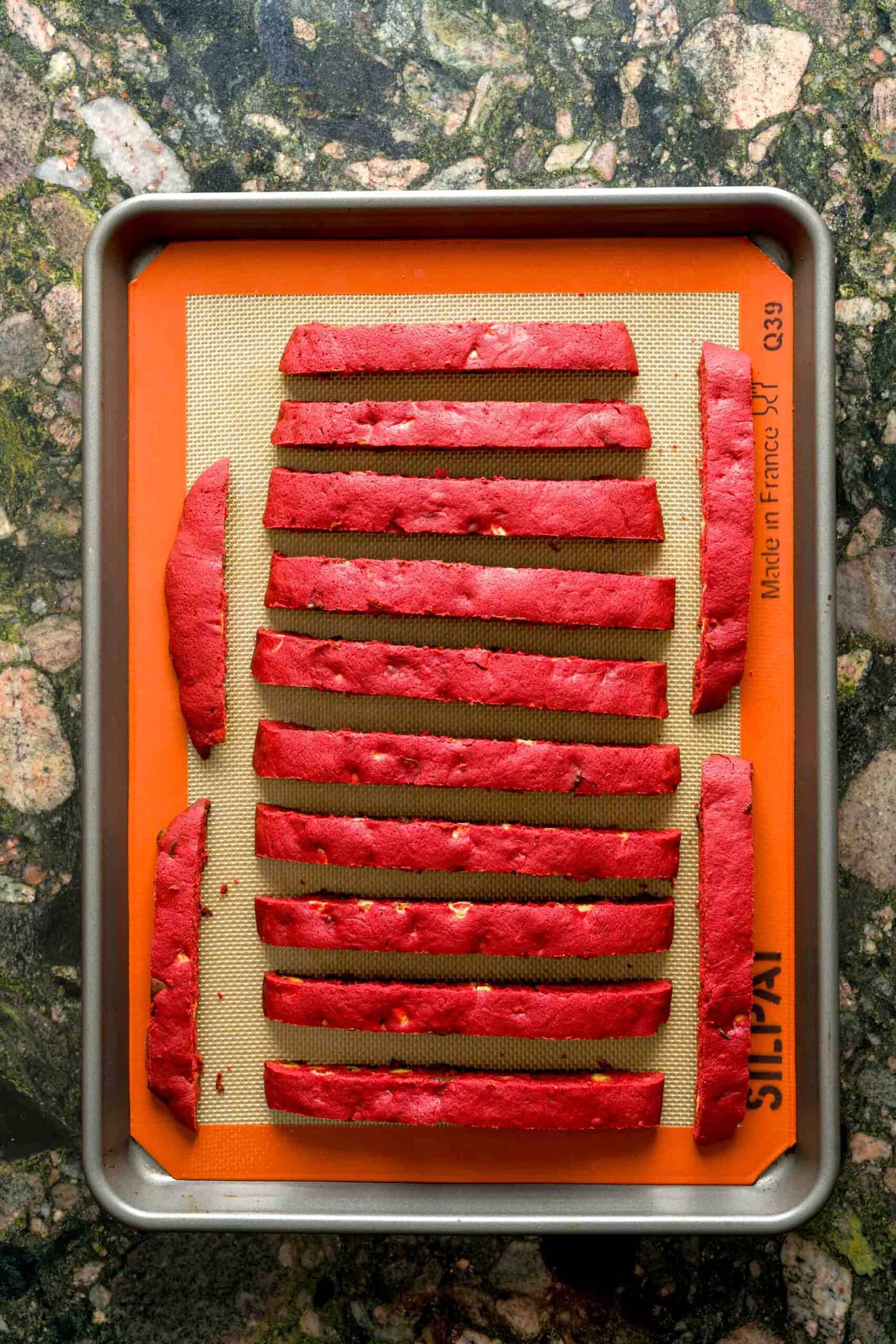 Chocolate Italian biscotti with chocolate chips on a baking tray, fresh out of the oven